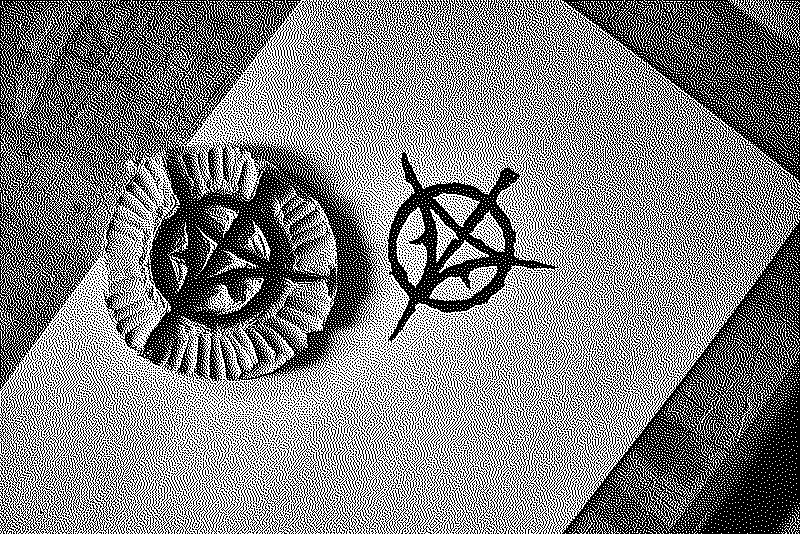 the printed symbol and the linocut