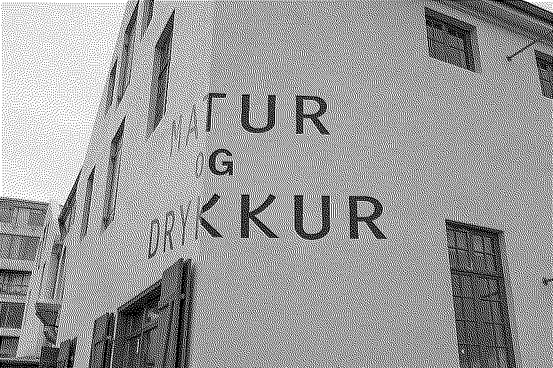 The Matur og Drykkur restaurant with it&rsquo;s painted sign on the corner of the building