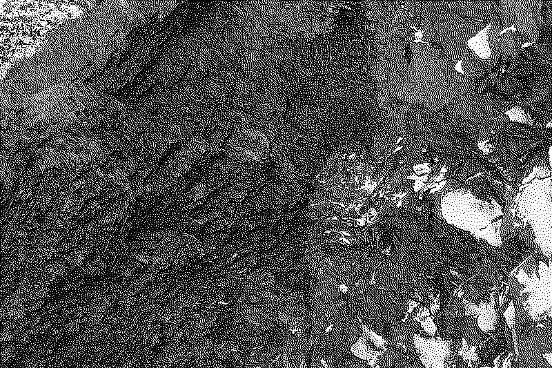 Large open stone cave nearby the black sand beach