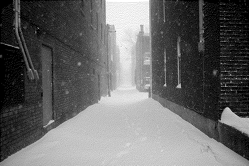 Empty alleyway covered in snow