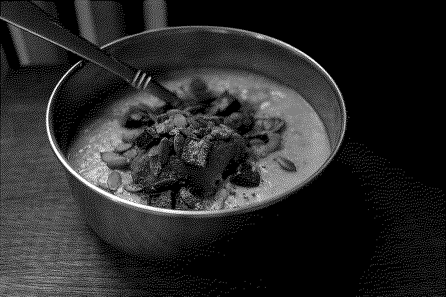 Steel-cut oats with pumpkin, spices and chocolate in a metal bowl