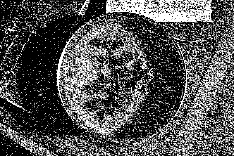 A bowl of potato soup with kale and sausages