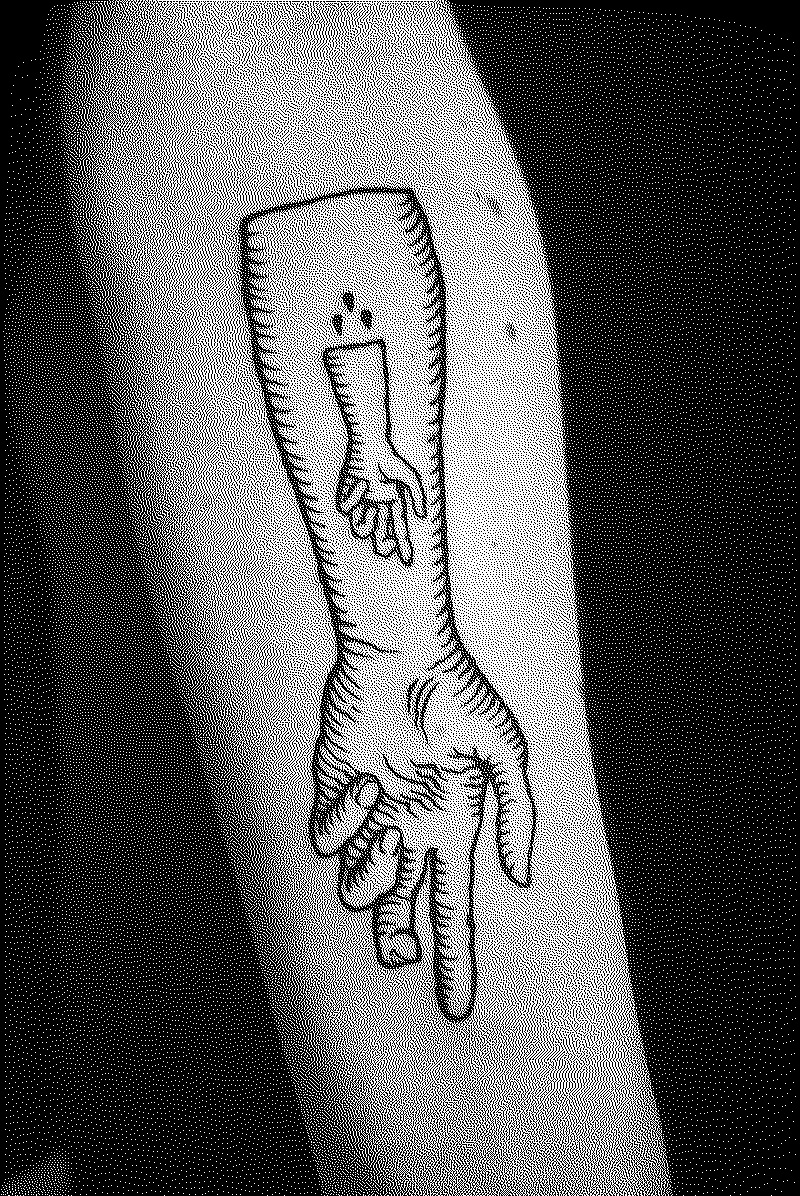 Arm with arm tattoo